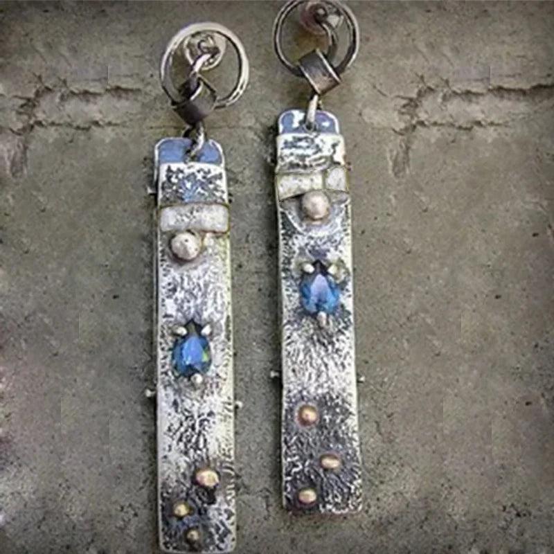 Handmade earrings made of blue stone