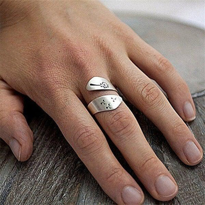 Adjustable hand-carved dandelion ring