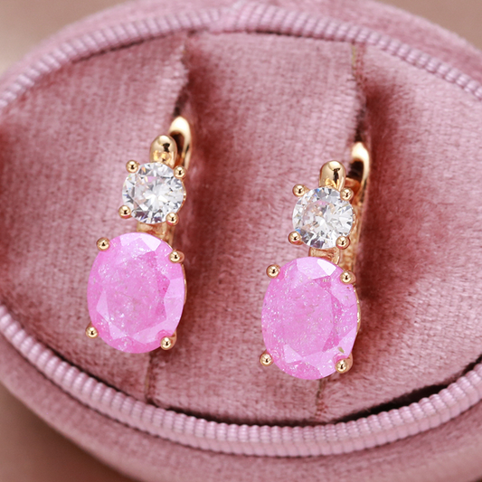 Elegant earrings with pink zirconia in gold